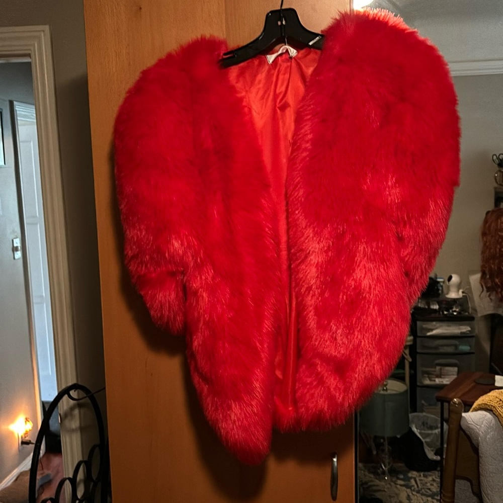 Red faux fur shawl.